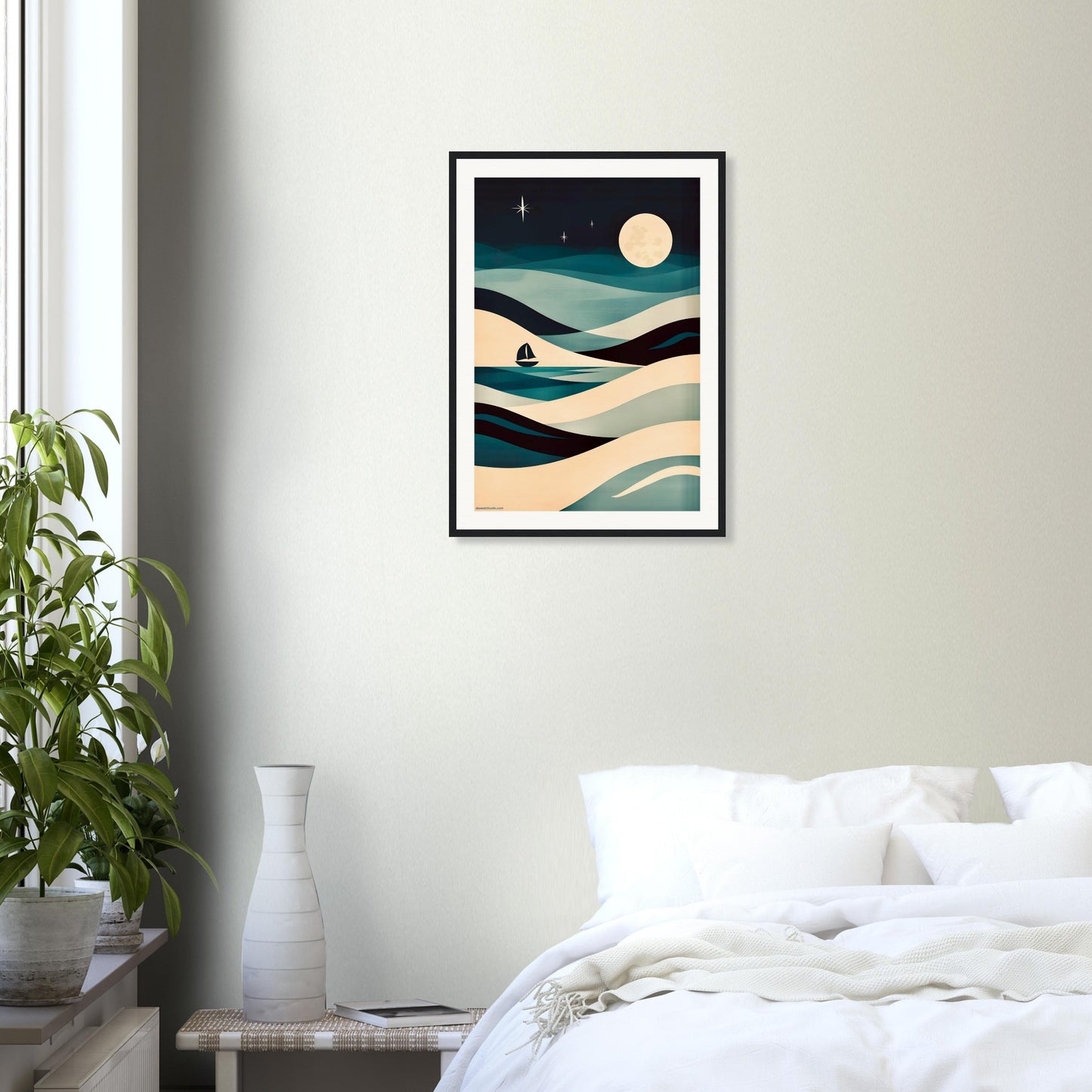Framed abstract seascape art with calming teal and beige palette on a wall above a bed in a bedroom.