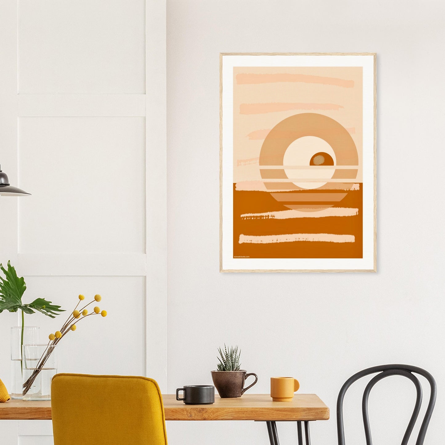 Abstract earth tones framed art in modern home office workspace, featuring an abstract sunset in a natural wooden frame 