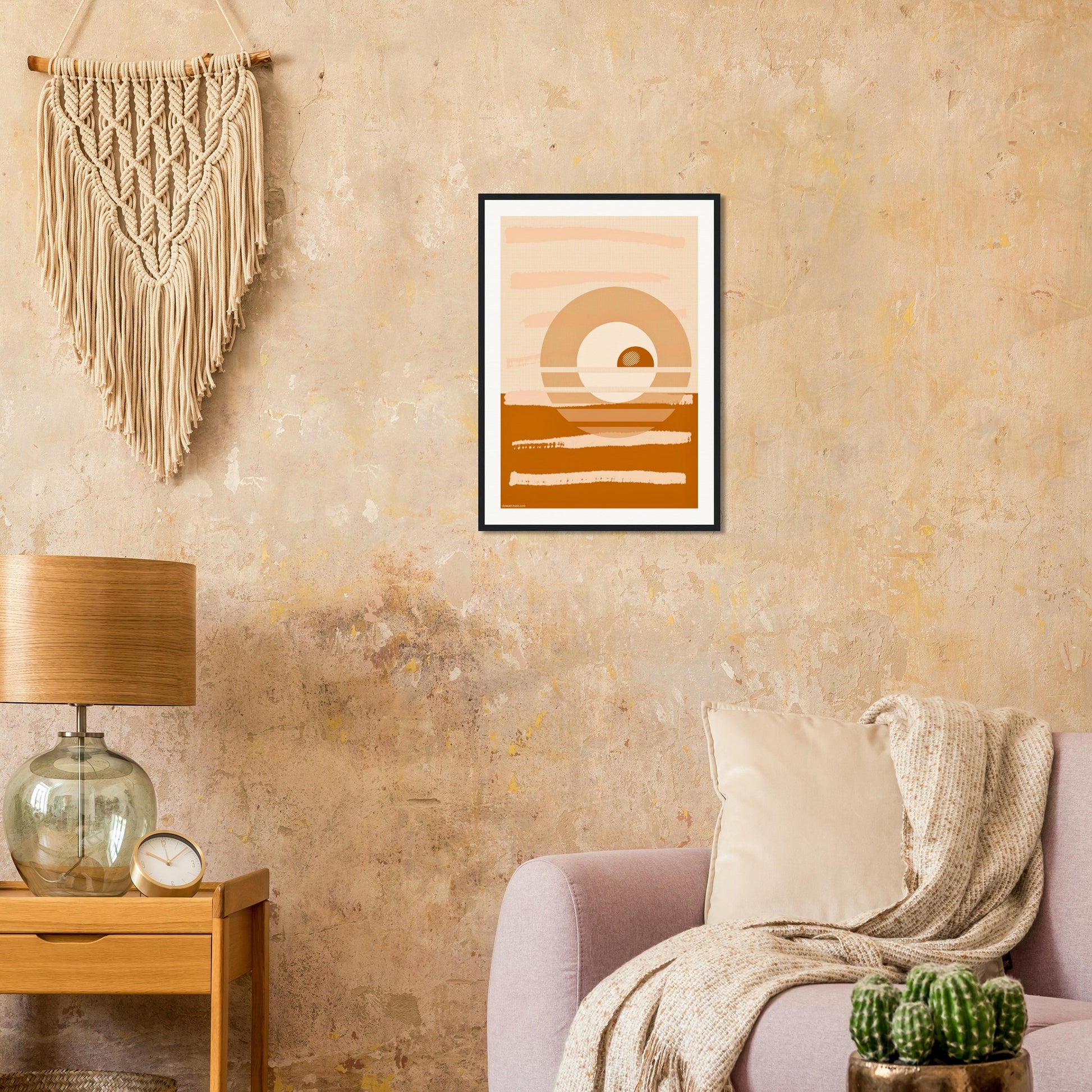 Terracotta and cream abstract wall art above armchair in contemporary living room.