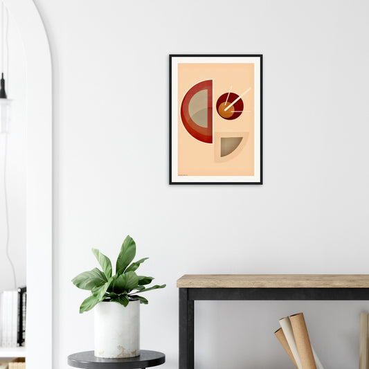 Framed Mid-Century abstract  geometric art print on a wall, above a desk with a plant