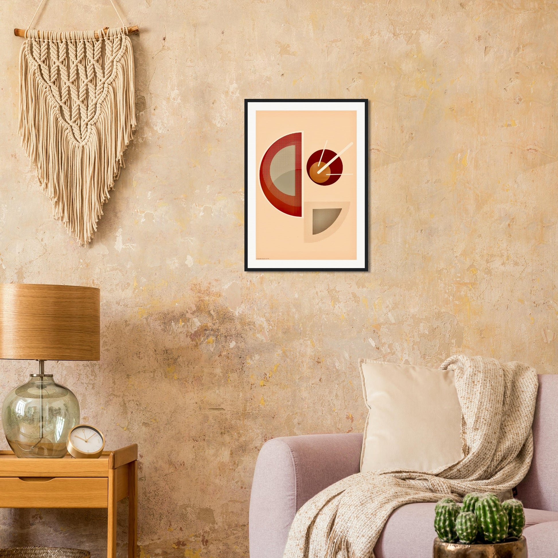 Boho living room with abstract geometric art on the wall, lamp, and decorative elements.